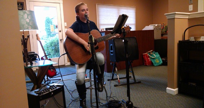 Izzi gives a private concert for Benjamin Richards at the Chiropractic Office.