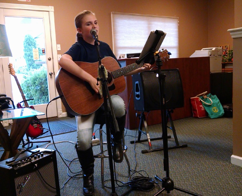 Izzi gives a private concert for Benjamin Richards at the Chiropractic Office.