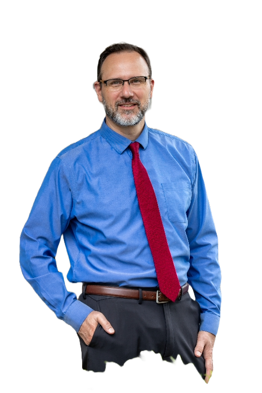 Dr. Richards stands in front of his chiropractic office in Hendersonville, NC